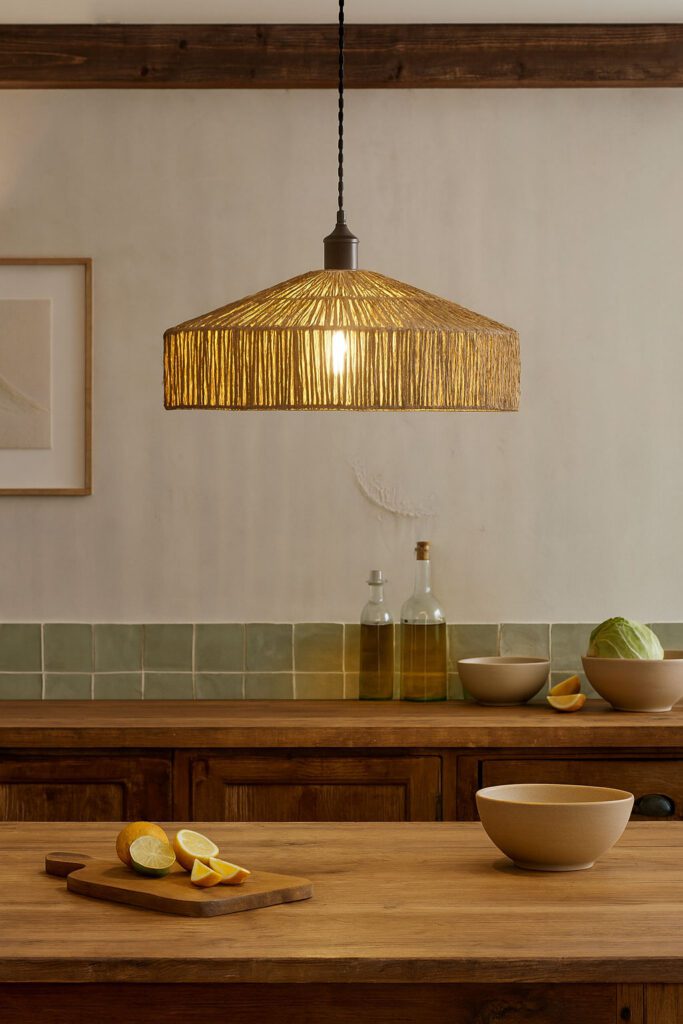 Elegant glass pendant light above stove