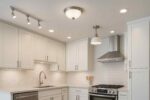 Kitchen Ceiling Lighting Ideas showcasing flush, semi flush, track and downlights in a modern kitchen