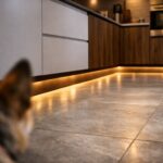 Modern kitchen base units with warm LED glow showcasing plinth lighting ideas for a subtle premium look.